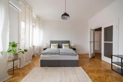 Łóżko lub łóżka w pokoju w obiekcie Marszałkowska 34