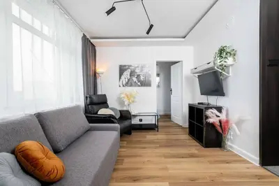 Część wypoczynkowa w obiekcie Monochrome Suites Lazienki Park
