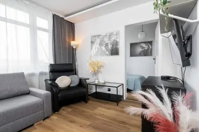 Część wypoczynkowa w obiekcie Monochrome Suites Lazienki Park