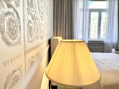 Łóżko lub łóżka w pokoju w obiekcie MONDRIAN Suites & Apartments Royal Route Old Town