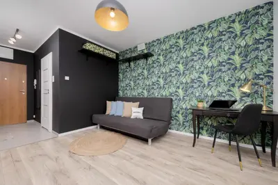 Część wypoczynkowa w obiekcie Piękne Studio z Balkonem dla 2 osób w Warszawie by Noclegi Renters