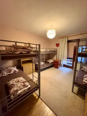 Łóżko lub łóżka w pokoju w obiekcie Vector Home