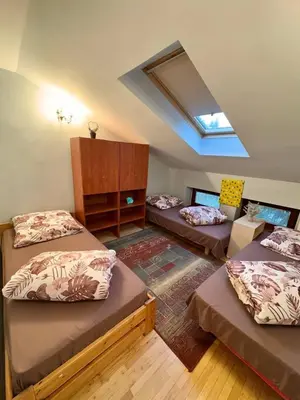 Łóżko lub łóżka w pokoju w obiekcie Vector Home