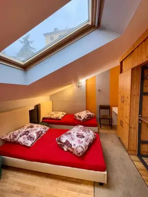 Łóżko lub łóżka w pokoju w obiekcie Vector Home