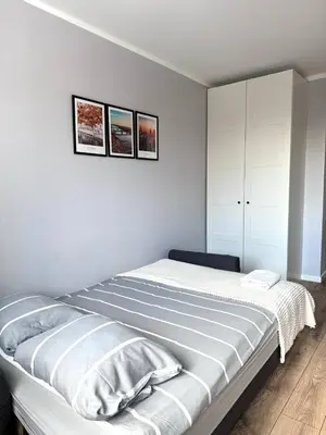 Łóżko lub łóżka w pokoju w obiekcie Studio in the Center - Prime Location