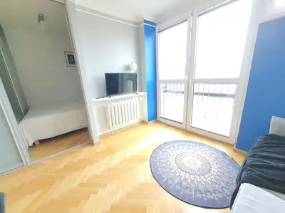 Telewizja i/lub zestaw kina domowego w obiekcie Chłodna cozy apartment