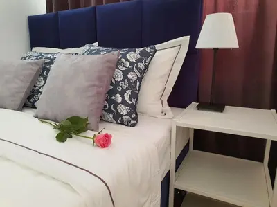 Łóżko lub łóżka w pokoju w obiekcie Chłodna cozy apartment