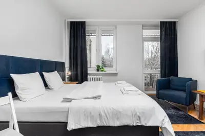 Łóżko lub łóżka w pokoju w obiekcie Apartament Niecała by Your Freedom