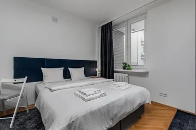Łóżko lub łóżka w pokoju w obiekcie Apartament Niecała by Your Freedom