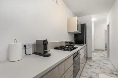 Kuchnia lub aneks kuchenny w obiekcie Apartament Niecała by Your Freedom