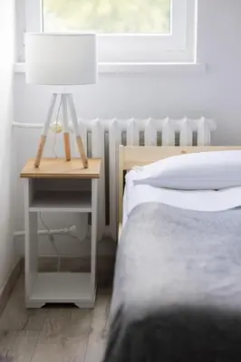 Łóżko lub łóżka w pokoju w obiekcie Bright Apartament Warsaw Wola Ideal for Remote Work by Noclegi Renters