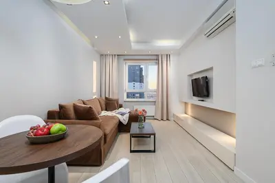 Telewizja i/lub zestaw kina domowego w obiekcie ShortStayPoland Platinum Towers Skyline