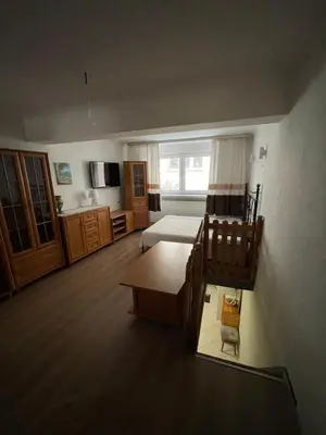Łóżko lub łóżka w pokoju w obiekcie Dwupiętrowe mieszkanie w centrum warszawy