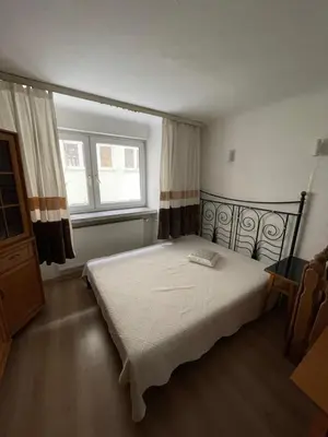 Łóżko lub łóżka w pokoju w obiekcie Dwupiętrowe mieszkanie w centrum warszawy