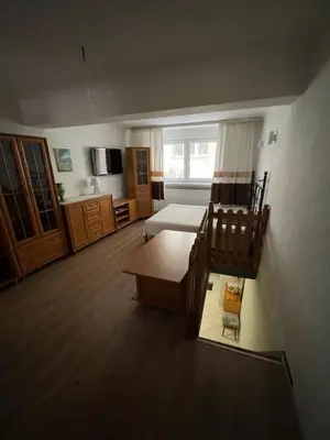 Łóżko lub łóżka w pokoju w obiekcie Dwupiętrowe mieszkanie w centrum warszawy