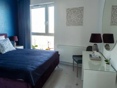 Łóżko lub łóżka w pokoju w obiekcie 11piętro