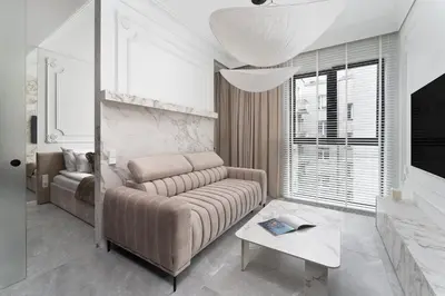 Część wypoczynkowa w obiekcie Chronos - Warszawa Wola by Downtown Apartments
