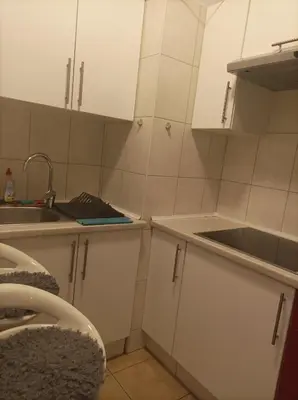 Kuchnia lub aneks kuchenny w obiekcie Solidarnosci155GuestRooms