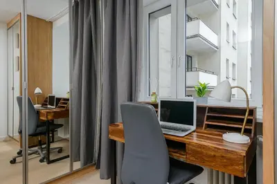 Telewizja i/lub zestaw kina domowego w obiekcie Lumina apartment in center Warsaw