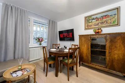 Telewizja i/lub zestaw kina domowego w obiekcie Lumina apartment in center Warsaw