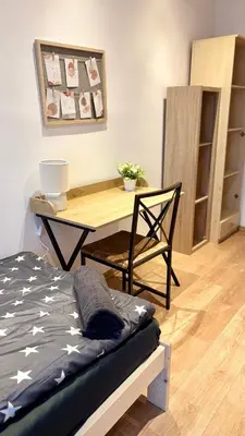 Łóżko lub łóżka w pokoju w obiekcie Rooms in Warsaw - K3