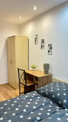 Łóżko lub łóżka w pokoju w obiekcie Rooms in Warsaw - K3