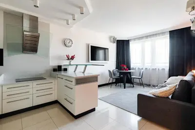 Telewizja i/lub zestaw kina domowego w obiekcie Sky Apartment