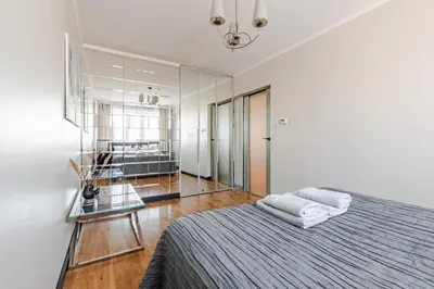 Łóżko lub łóżka w pokoju w obiekcie Sky Apartment