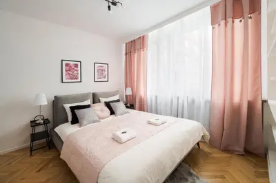 Łóżko lub łóżka w pokoju w obiekcie Pulawska Residence Mokotów 2-bedroom & living room, balcony & free parking on site