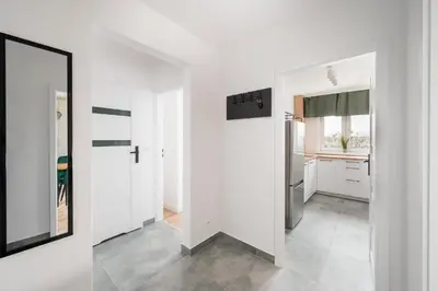 Kuchnia lub aneks kuchenny w obiekcie Elbląska Modern Apartment by BookingHost