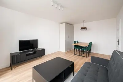 Telewizja i/lub zestaw kina domowego w obiekcie Elbląska Modern Apartment by BookingHost