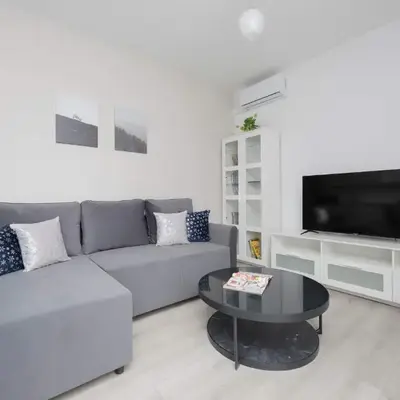 Family Apartment Cybernetyki with AC and Parking by Noclegi Renters
