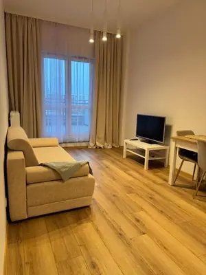 Telewizja i/lub zestaw kina domowego w obiekcie MaxApart Apartament Wiktoryn