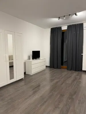 Telewizja i/lub zestaw kina domowego w obiekcie MaxApart Muranów