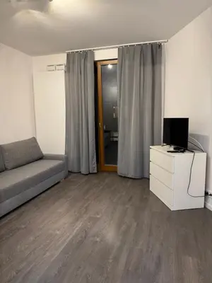 Telewizja i/lub zestaw kina domowego w obiekcie MaxApart Muranów