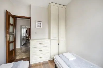 Łóżko lub łóżka w pokoju w obiekcie Labo Apartment Dzielna