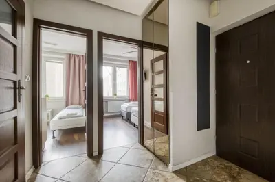 Łóżko lub łóżka w pokoju w obiekcie Labo Apartment Dzielna