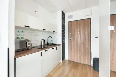 Kuchnia lub aneks kuchenny w obiekcie Wola Expo City View Central Apartment by BookingHost