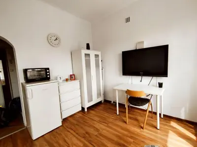Kuchnia lub aneks kuchenny w obiekcie Cozy Studio at Plac Konstytucji