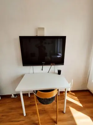 Telewizja i/lub zestaw kina domowego w obiekcie Cozy Studio at Plac Konstytucji