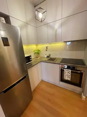 Kuchnia lub aneks kuchenny w obiekcie HomeComfort Jana Kazimierza