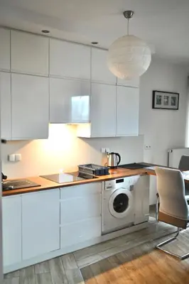 Kuchnia lub aneks kuchenny w obiekcie Apartments przy metro Kondratowicza,Targówek