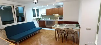 Kuchnia lub aneks kuchenny w obiekcie Żelazna Center Apartment