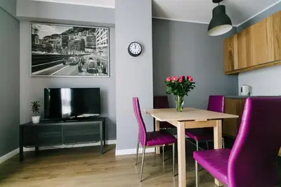 Telewizja i/lub zestaw kina domowego w obiekcie RENTTNER Apartamenty