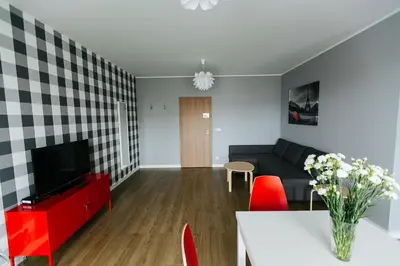 Telewizja i/lub zestaw kina domowego w obiekcie RENTTNER Apartamenty