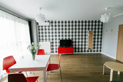 Telewizja i/lub zestaw kina domowego w obiekcie RENTTNER Apartamenty