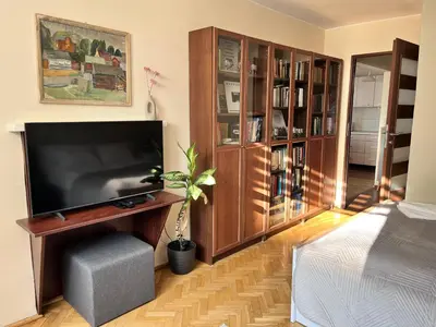 Łóżko lub łóżka w pokoju w obiekcie OhMyHome-Plac Zawiszy