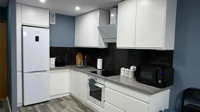 Kuchnia lub aneks kuchenny w obiekcie Apartament Grzybowska
