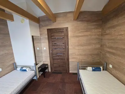 Łóżko lub łóżka w pokoju w obiekcie Rooms4Rest Skibicka - Private rooms for tourists