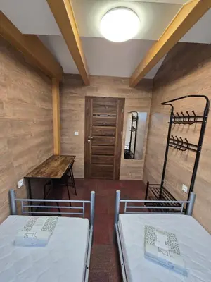 Łóżko lub łóżka w pokoju w obiekcie Rooms4Rest Skibicka - Private rooms for tourists